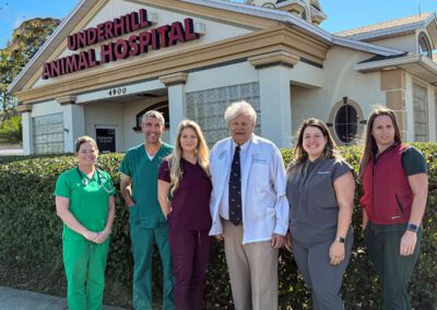 team standing in front of Underhill Animal Hospital